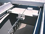 Automatic grease removal by means of a paddle system